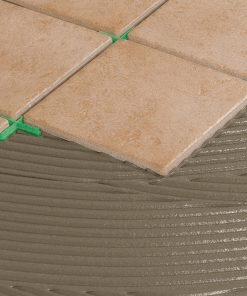 CIMENTS-COLLES POUR LA POSE SUR CARRELAGE SUR UNE COUCHE DÉSOLIDARISANTE EN INTÉRIEUR